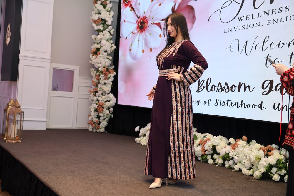 Speaker on stage, Cherry Blossom Eid